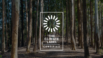 Eucalyptus forest with The Climate Label Certified mark.