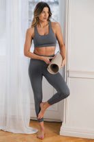 Woman wearing Tripulse Sports Bra Moonstone Grey